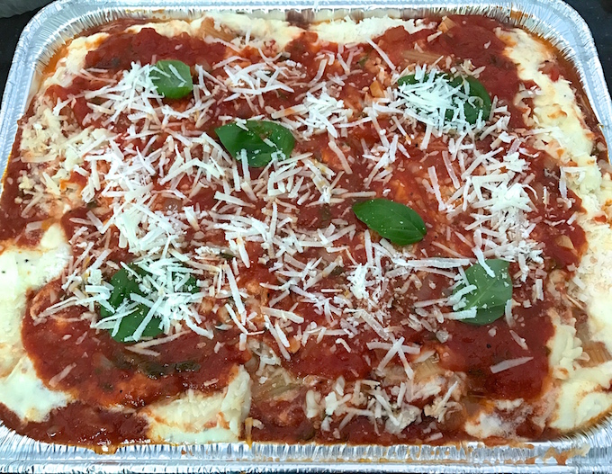 Baked Rigatoni with Three Cheeses is pure comfort food that fills the belly and the soul. Homemade tomato sauce mixed with ridged rigatoni pasta, layered with a combination of ricotta and Parmesan cheese, followed by mozzarella, then topped with Parmesan. Perfect for dinner, cookouts, and family events. Mangia!