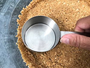 This is indeed the Ultimate Key Lime Pie. A velvety smooth texture that’s perfectly tart from key lime juice yet sweetened from condensed milk poured into a graham cracker crust providing the perfect foundation for the perfect filling. Two choices of toppings puts this pie over the top.