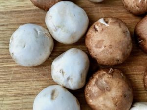 Button and cremini mushrooms.