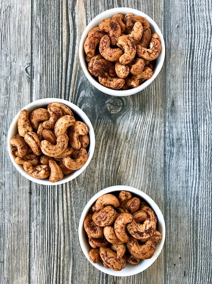 Three little bowls of Roasted Spiced Cashews.