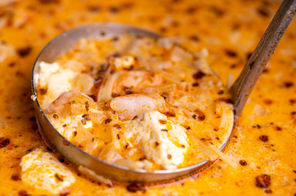 A ladle of Peruvian shrimp soup.