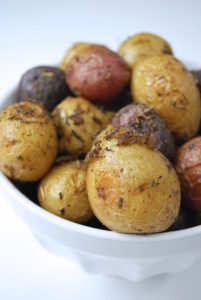 Roasted Baby Potatoes with Rosemary and Thyme is a classic combination of flavors to accompany your meal. Takes 5 minutes to prepare and uses one pan. Easy! Use a combination of whites, reds, and purples for a colorful presentation.