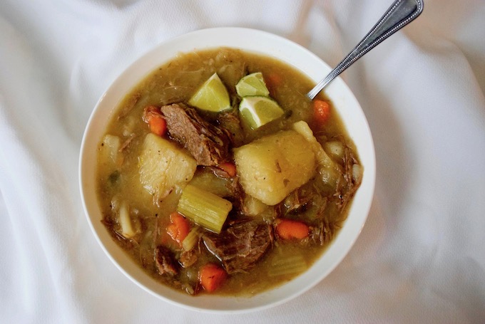 A bowl of beef cabbage soup.