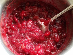 Thickened cranberry sauce in chunky state.