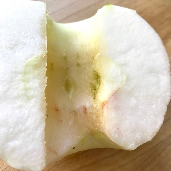 Half of an apple showing the endocarp.