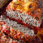 Italian meatloaf sliced and ready to eat.