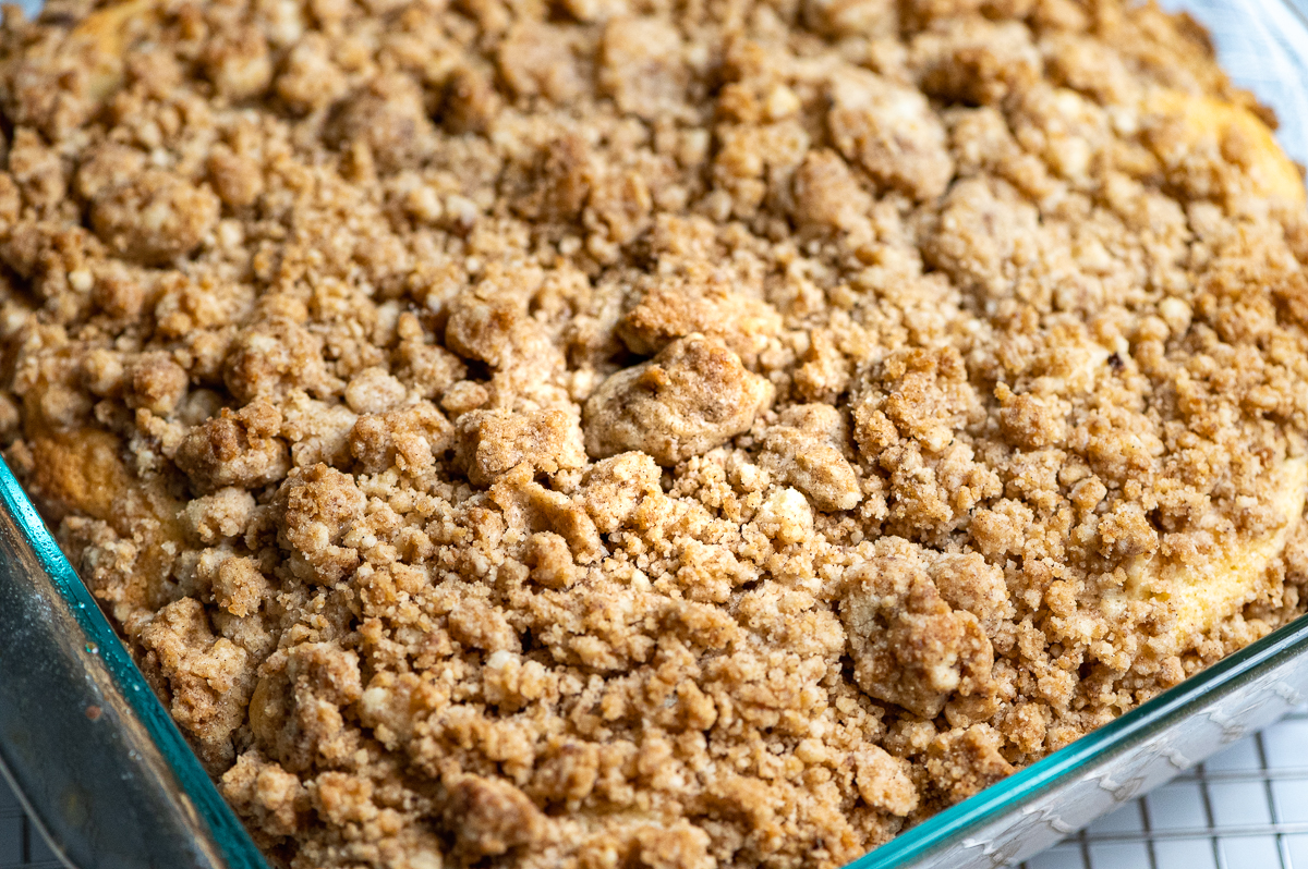 A top view of the crumb topping for coffee cake in a pan.