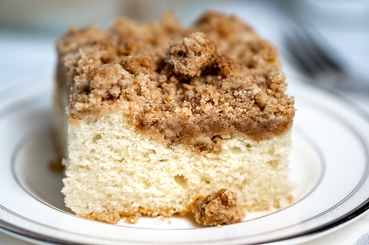 Closeup of a piece of coffee cake on a plate.