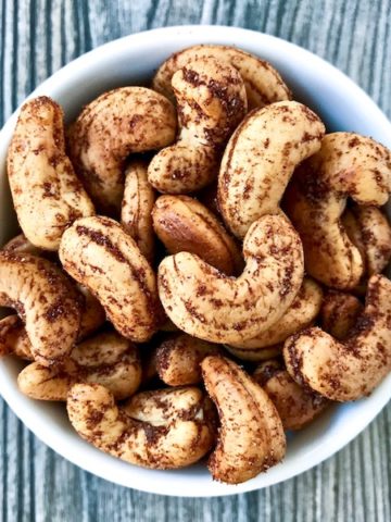 A bowl of Roasted Spiced Cashews.