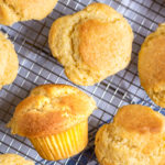 Corn muffins on a cooling rack.