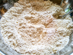Butter mixed with flour in a bowl.