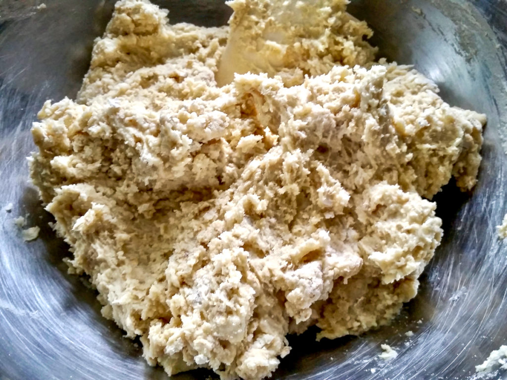 Shaggy scone dough in a bowl.