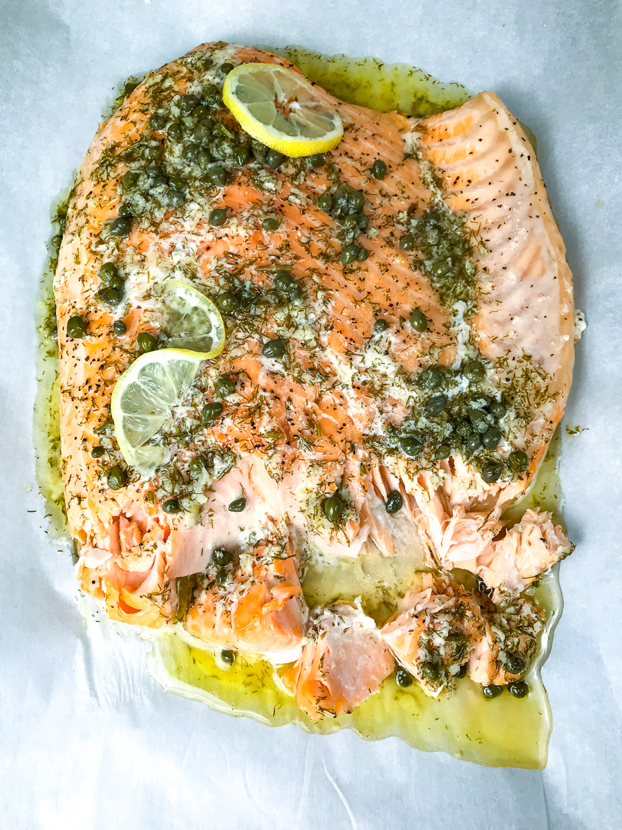 A slow roasted salmon fillet covered with lemon dressing.