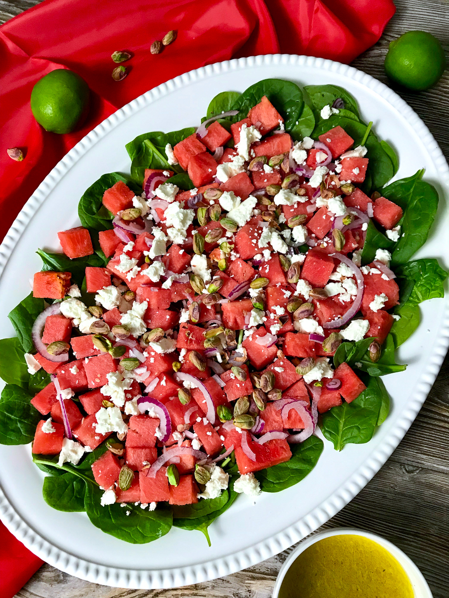 Watermelon feta salad on a white platter.