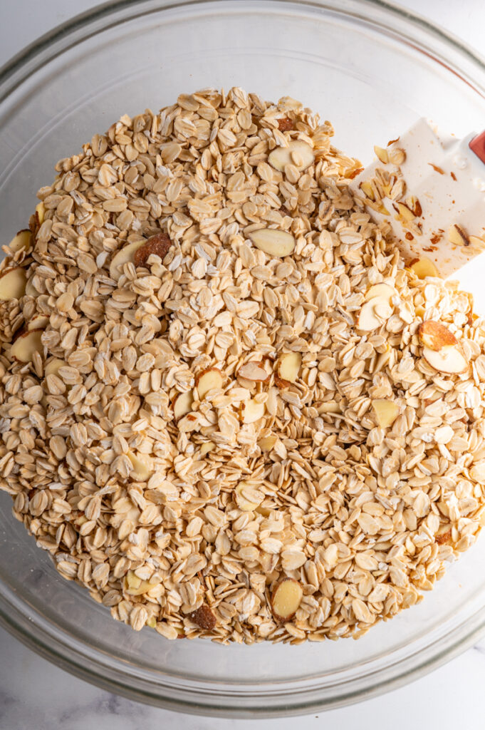 Dry ingredients for granola mixed in a bowl.