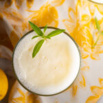 Top view of a glass of pineapple ginger lemonade.