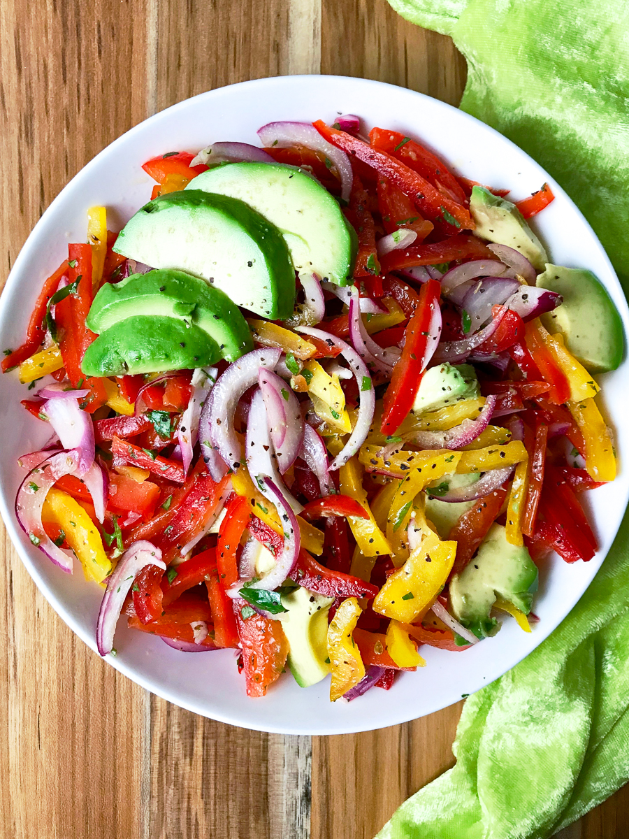 A bowl of sweet pepper and avocado salad.