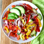 A bowl of sweet pepper and avocado salad.