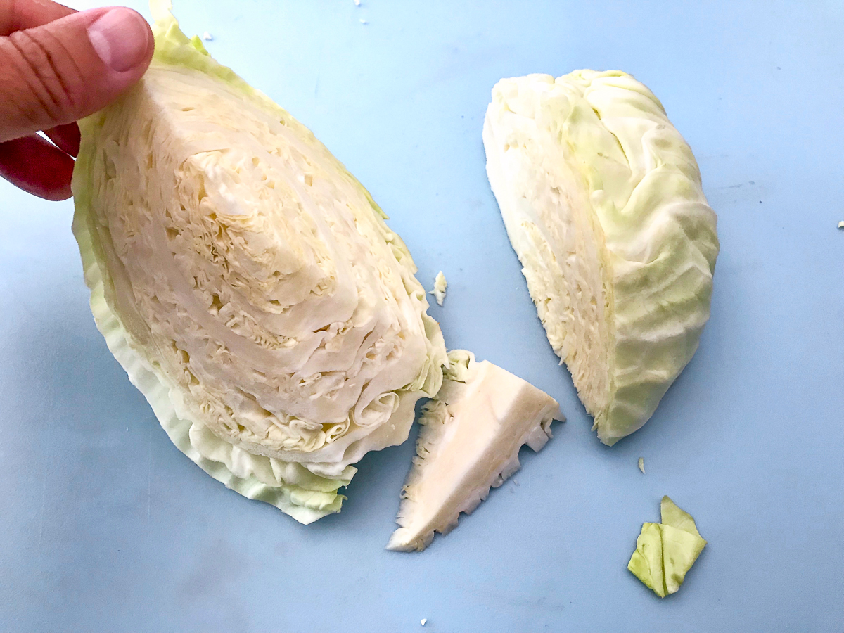 Removing the core from a cabbage.