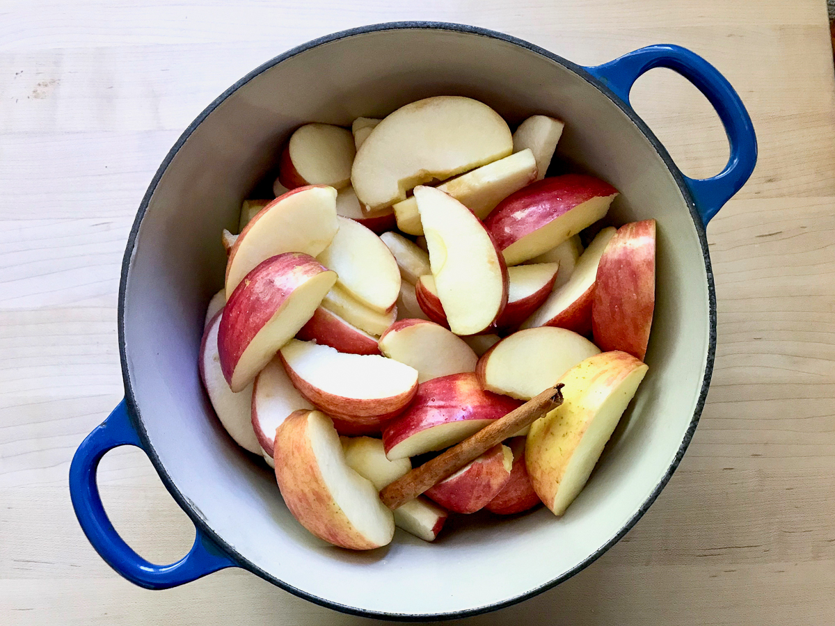 Sliced apples in a saucepan.