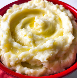 A bowl of garlic mashed potatoes.