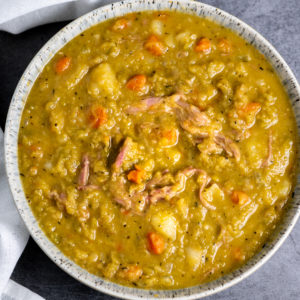 A bowl of split pea and ham soup.