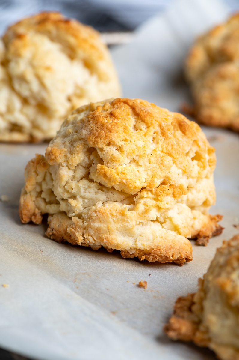 Closeup of a baked sour cream drop biscuit.