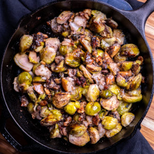 Roasted Brussels sprouts in a cast iron skillet.