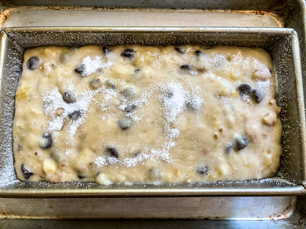 Batter in a loaf pan ready to bake.