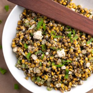 Mayo-Free Mexican street corn salad in a white bowl.