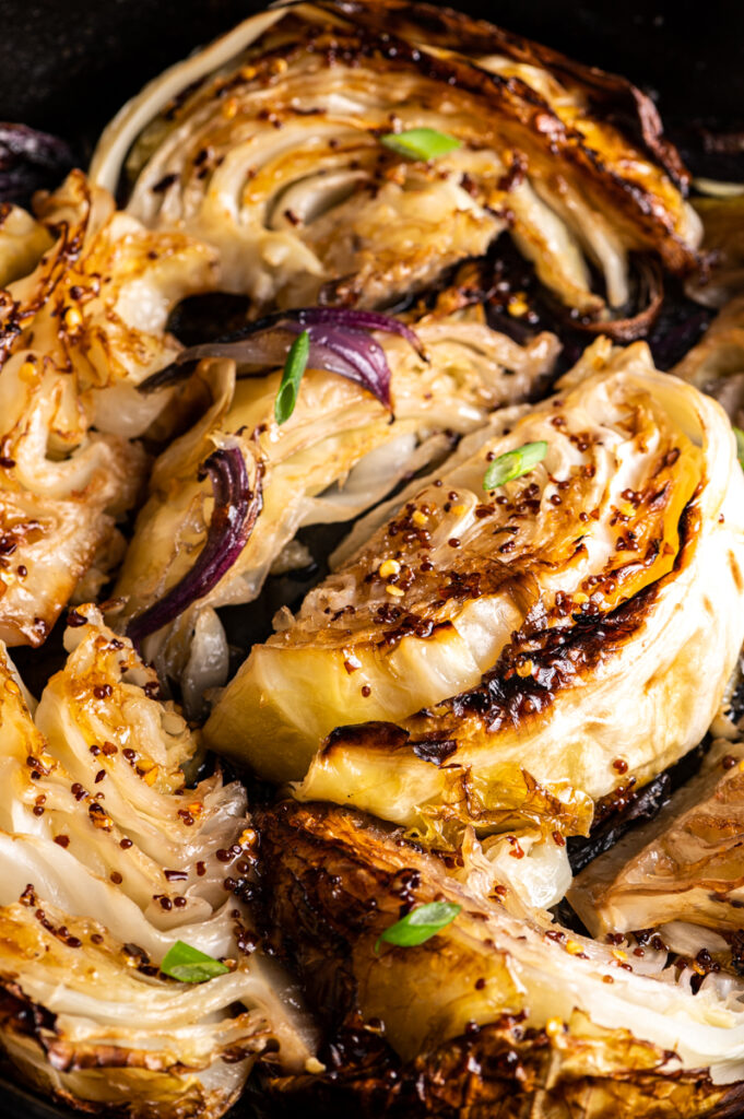 Roasted cabbage wedges drizzled with honey.
