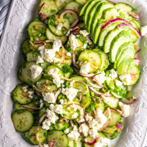 Peruvian cucumber salad topped with feta and avocado.